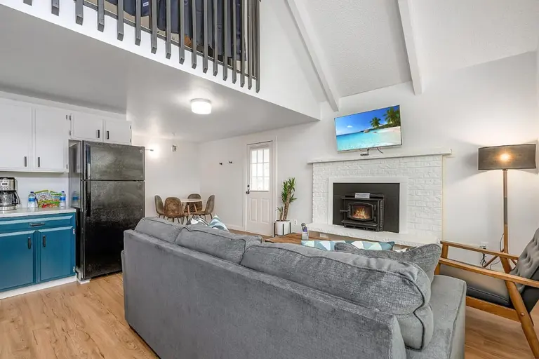 Open living room and kitchen in Tidal House Chalet 1.